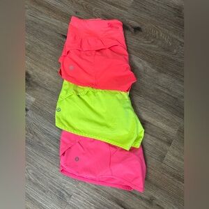 LOT of 3: Lululemon neon speed shorts 4 way stretch size 6